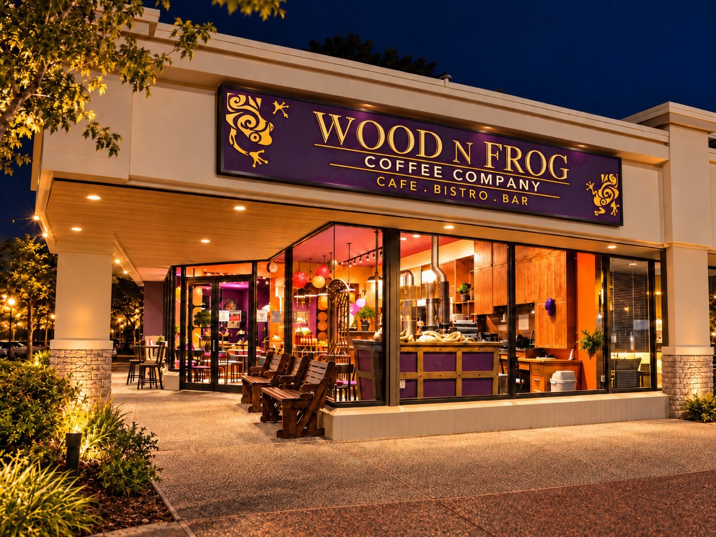 Wood N Frog Coffee Company storefront lit up at night, with the purple Cafe · Bistro · Bar sign